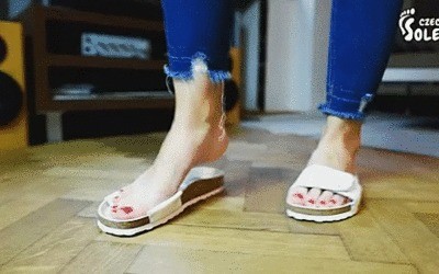 Cork Slippers And Bare Feet Posing POV