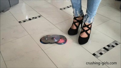 Jennifer Crushing Cd’s In High Heels