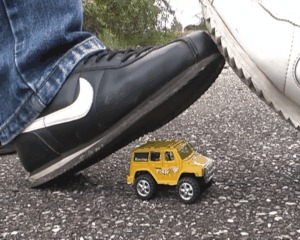 Black And White Nikes Vs Small Cars